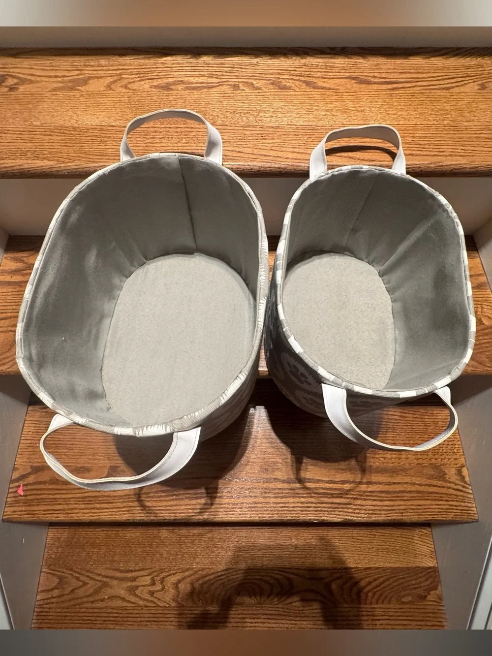 Set of gray & white paw print canvas storage baskets with white leather handles